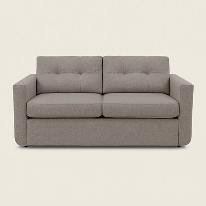 Gray sofa on a beige background