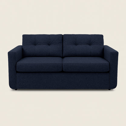 Navy blue sofa on a beige background