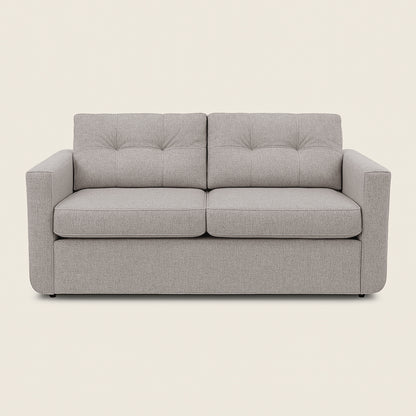 Gray sofa on a beige background
