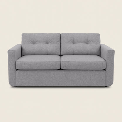 Gray sofa on a beige background
