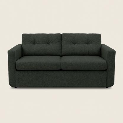 Dark gray sofa on a beige background