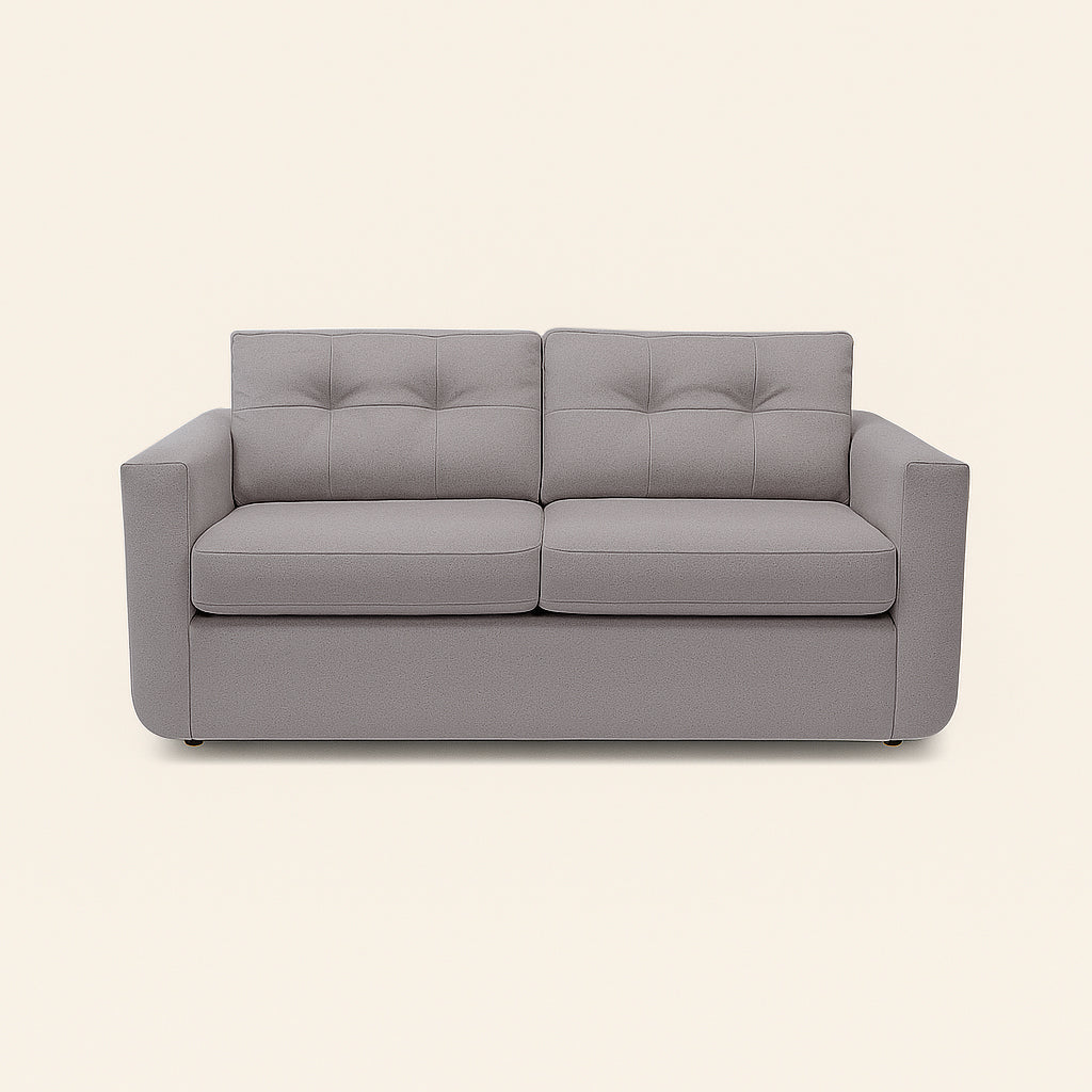 Gray sofa on a beige background