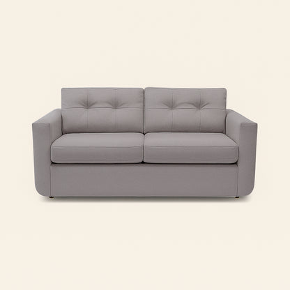 Gray sofa on a beige background