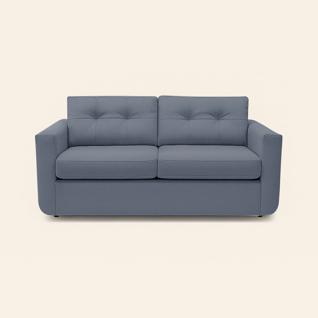 Blue sofa on a beige background