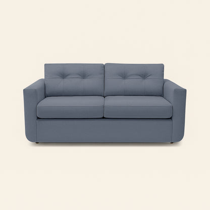 Blue sofa on a beige background