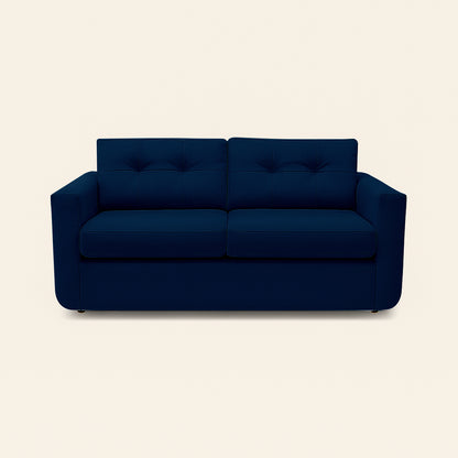 Blue sofa on a beige background