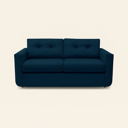 Blue sofa on a beige background