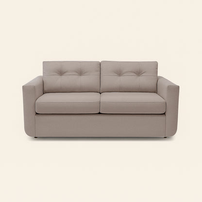Gray sofa on a beige background
