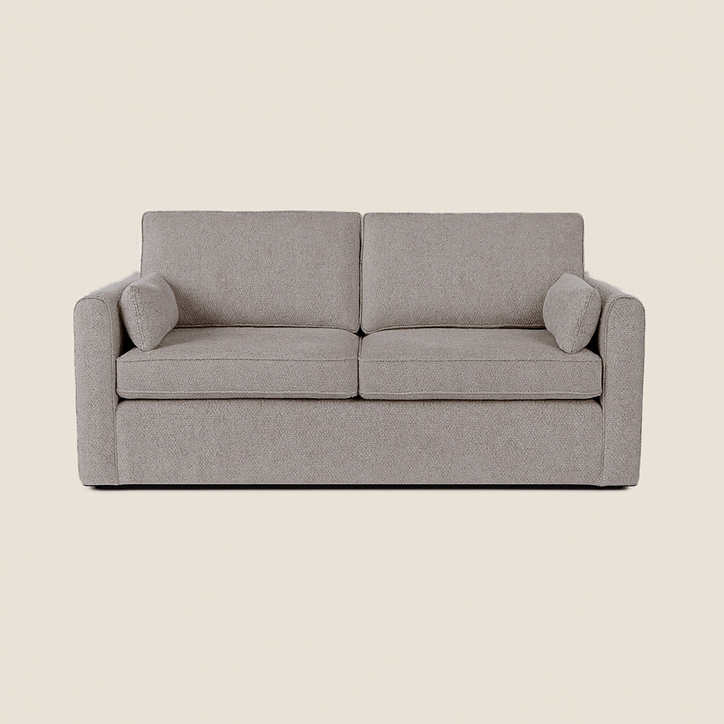 Gray sofa on a beige background