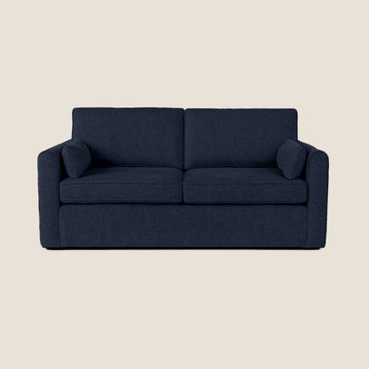 Navy blue sofa on a beige background
