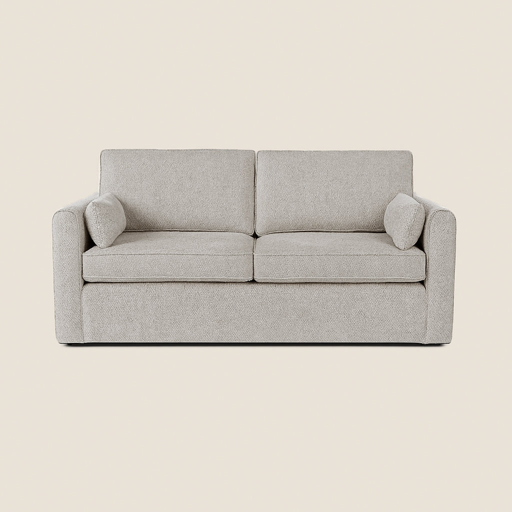 Gray sofa on a beige background