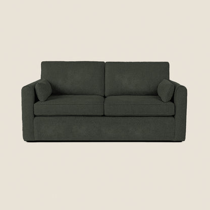 Dark gray sofa on a beige background