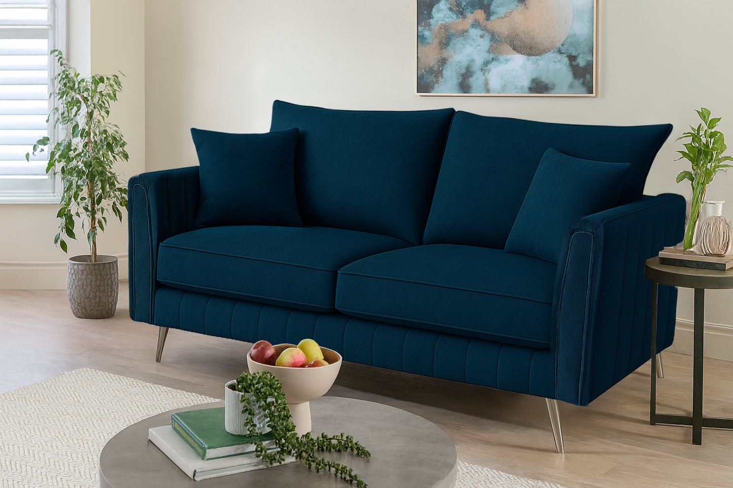 Blue sofa in a living room with decor elements.