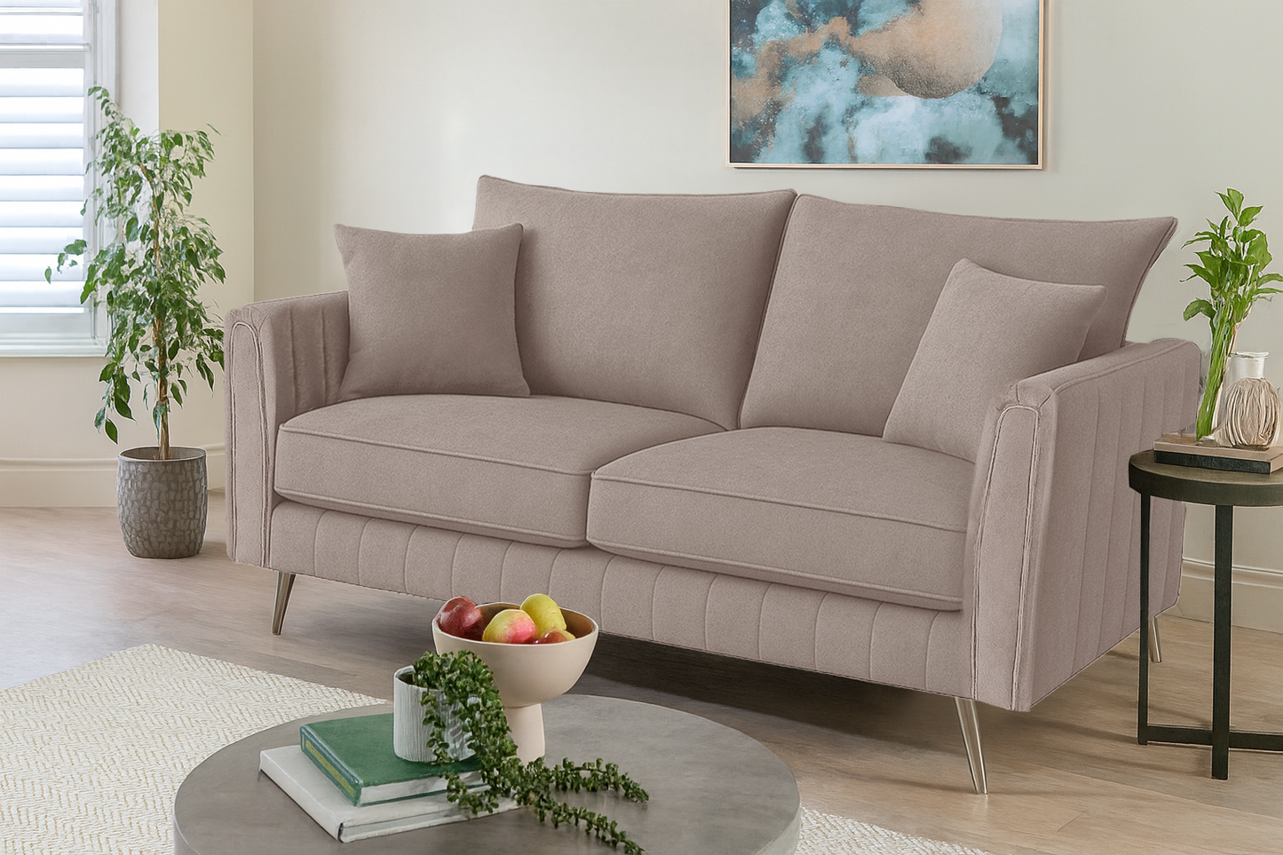 Beige sofa in a living room setting with decor elements.