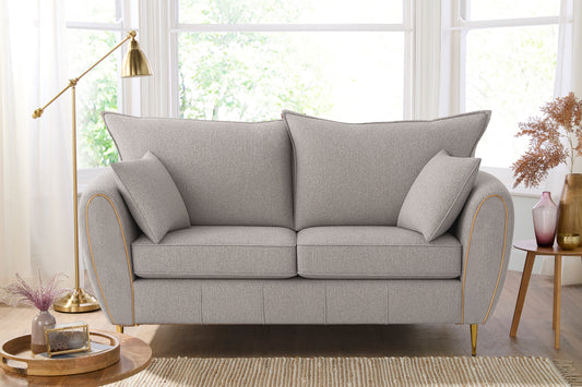 Gray sofa in a living room with decor elements