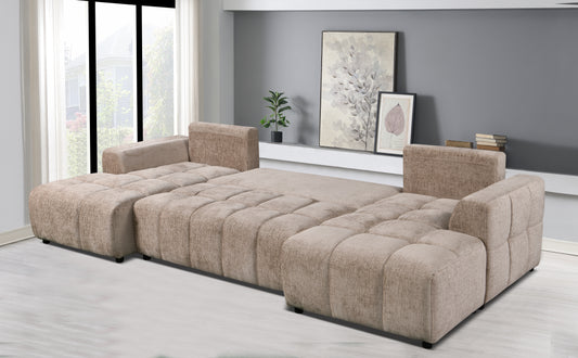 Beige sectional sofa in a living room setting with artwork on the wall.