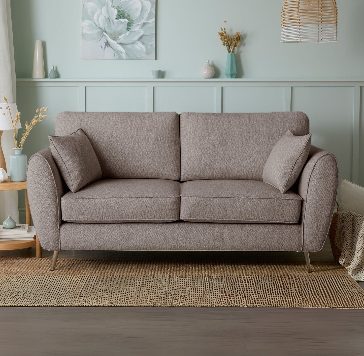 Gray sofa in a living room with decorative elements.