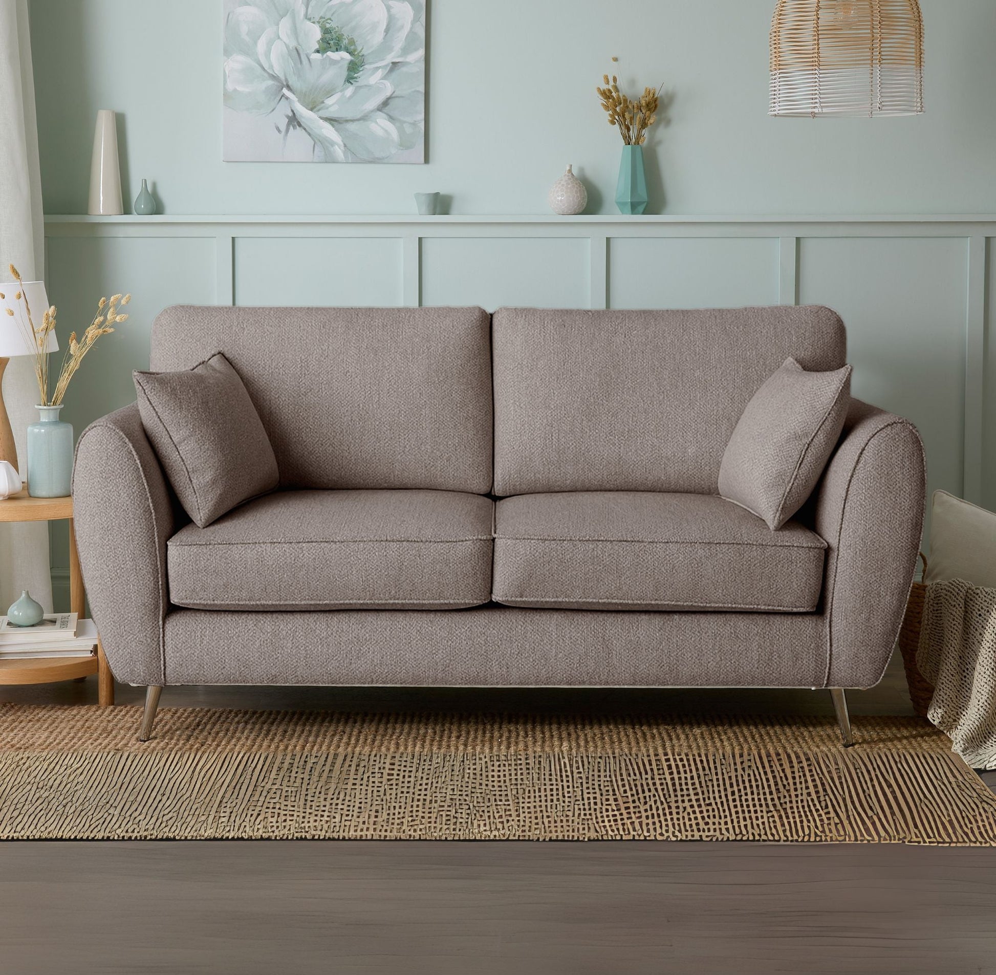 Gray sofa in a living room with decorative elements.