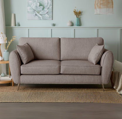Gray sofa in a living room with decorative elements.