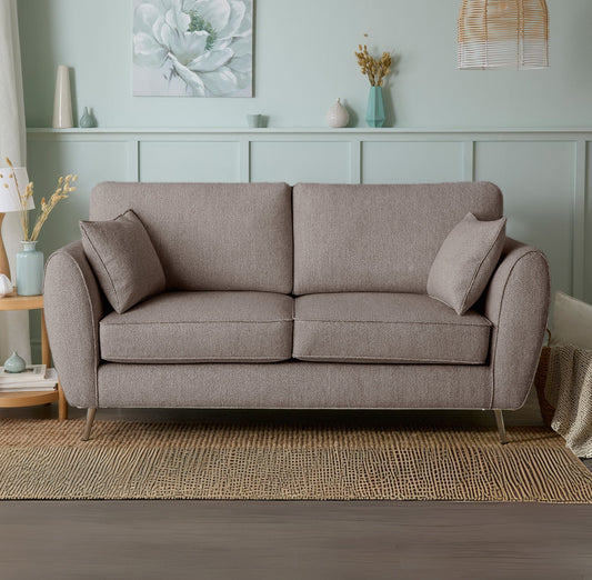 Gray sofa in a living room with decorative elements.