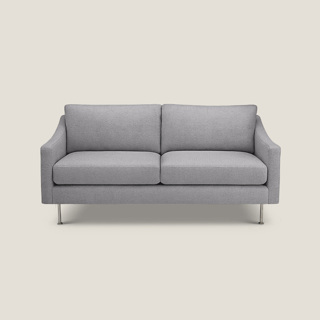 Gray sofa on a light beige background