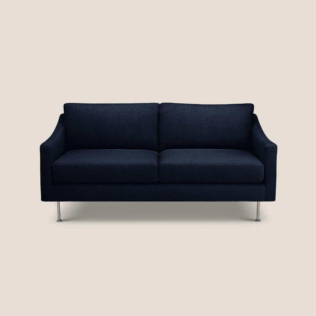 Navy blue sofa on a light beige background
