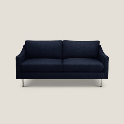 Navy blue sofa on a light beige background